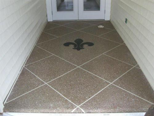 Patio overlay with diamond pattern, and a Fleur De Lis