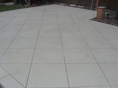 Concrete overlay with tile pattern