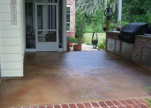Concrete overlay with brick border