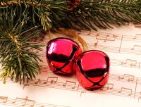 jingle bells on a page of musical notes