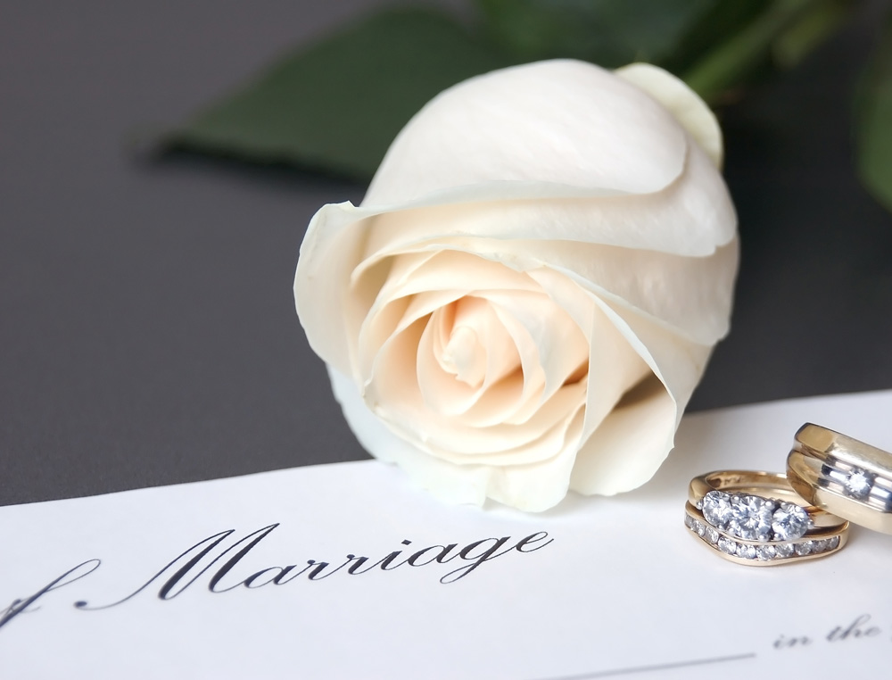 Certificate of Marriage with wedding rings