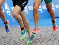 legs of three runners