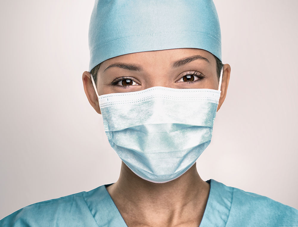 doctor with mask and scrubs
