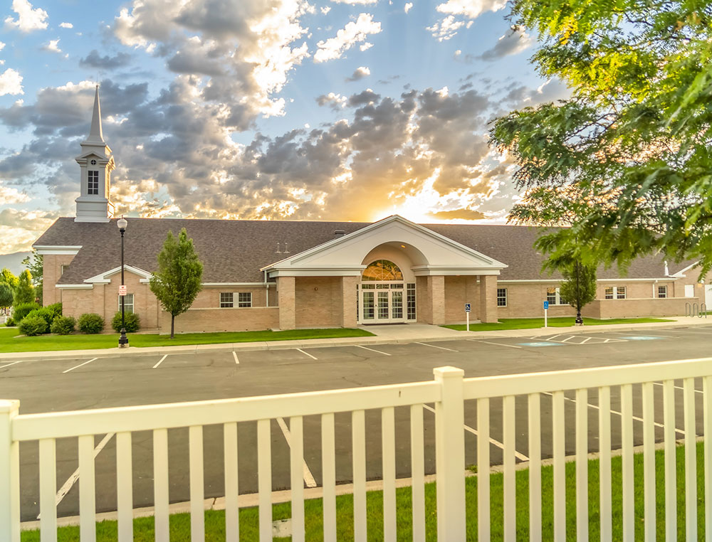 view of a church and its parking lot