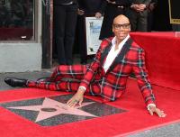 RuPaul with his star of fame in Hollywood