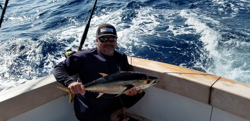 "Excuse" L&H 33' Walkaround. Angler with His Catch