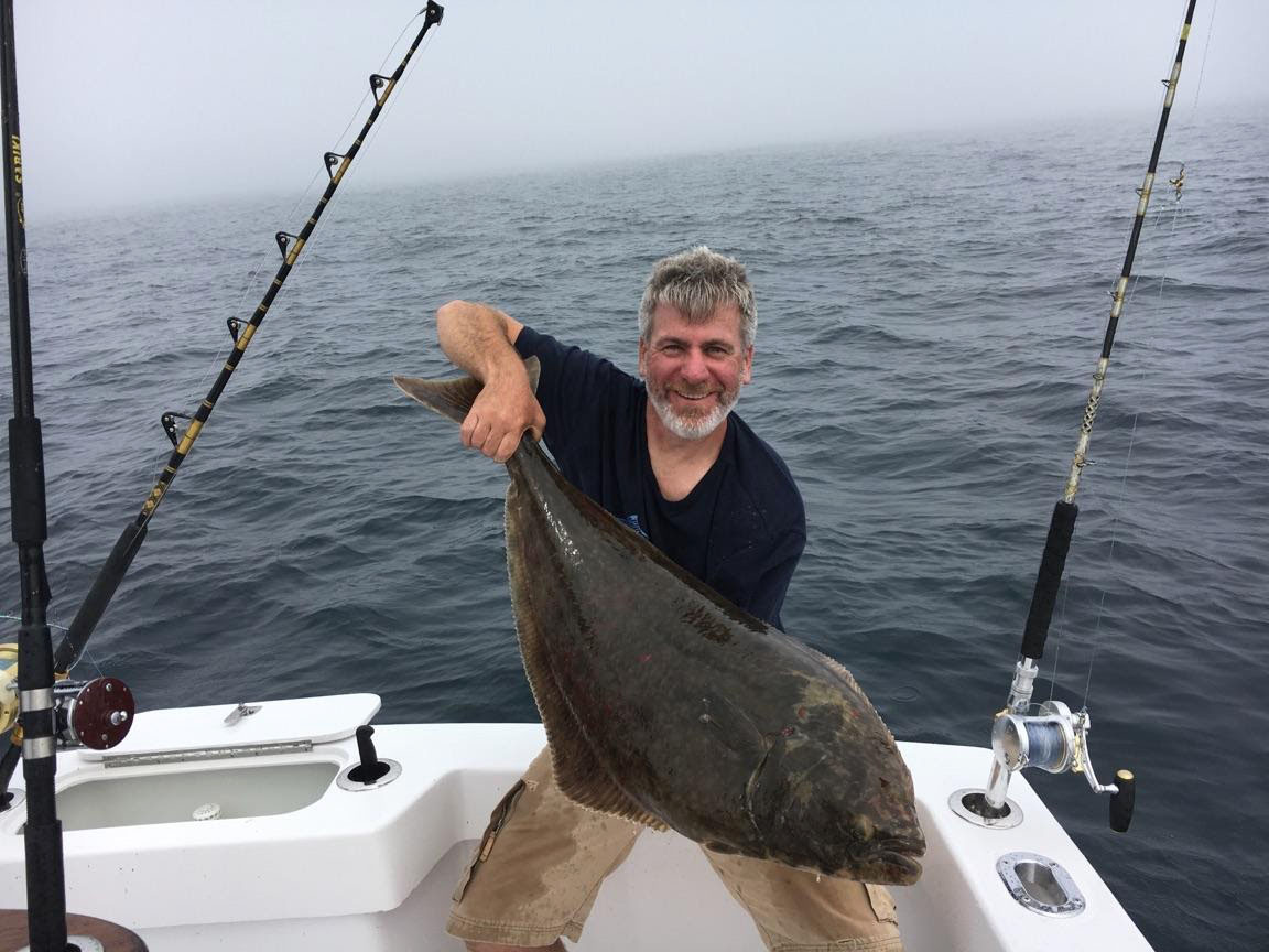 "Excuse" L&H 33' Walkaround. Angler with His Catch