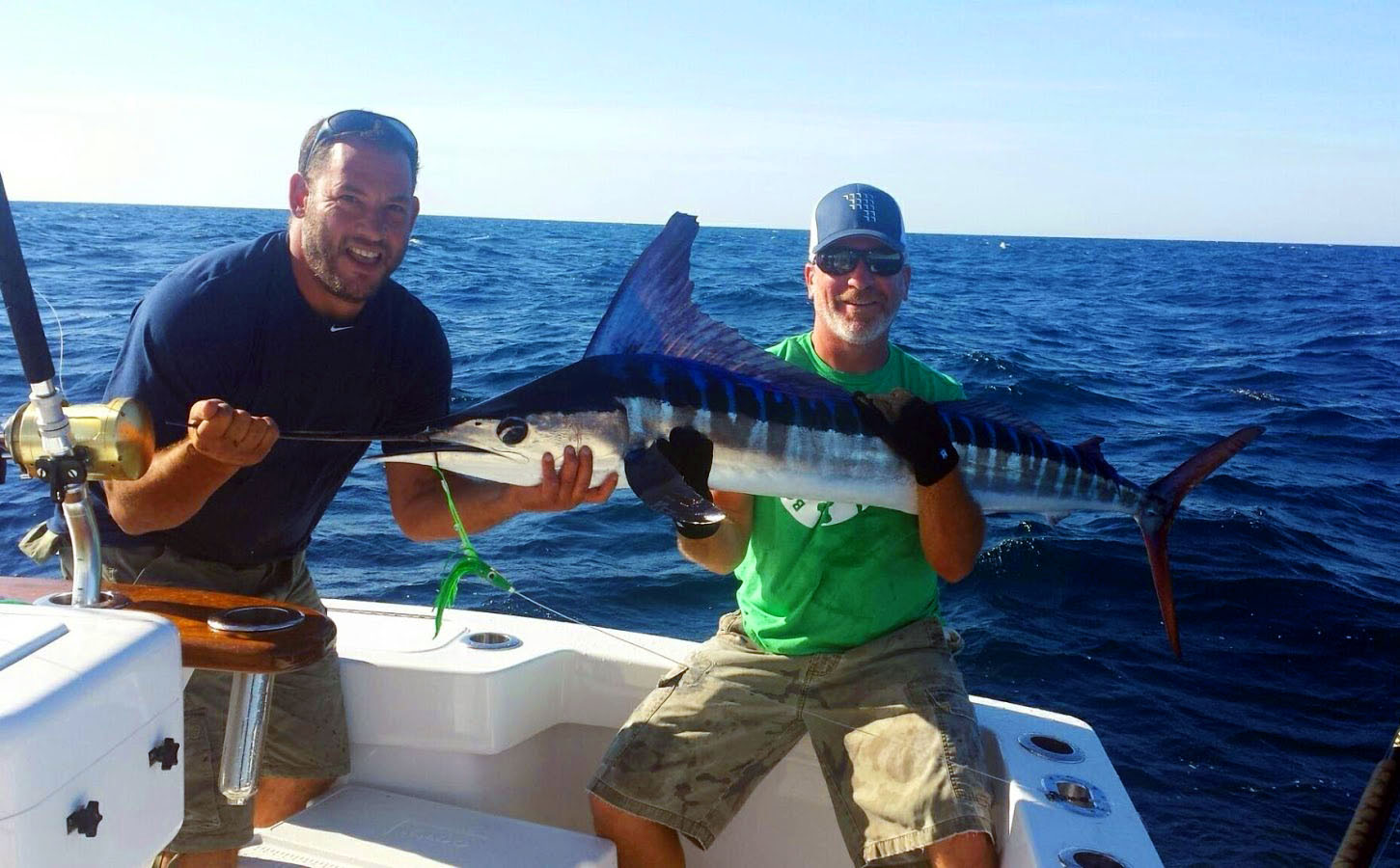 "Akiba" L&H 33' Walkaround. Angler with His Catch