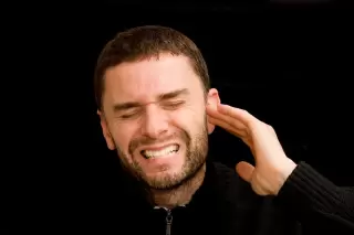 Man experiencing ringing in his ear