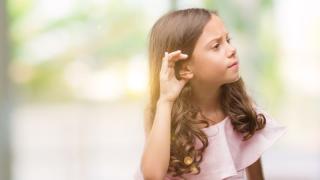 little girl who is hard of hearing
