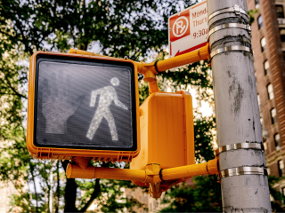 Walking Traffic Light | Sloan Firm 