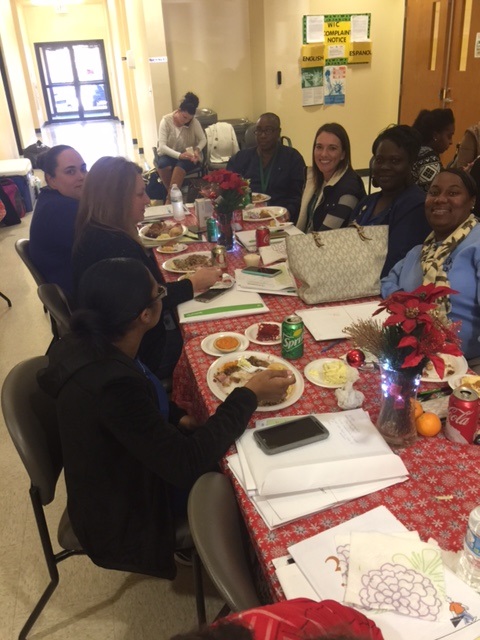 Employees enjoying holiday lunch