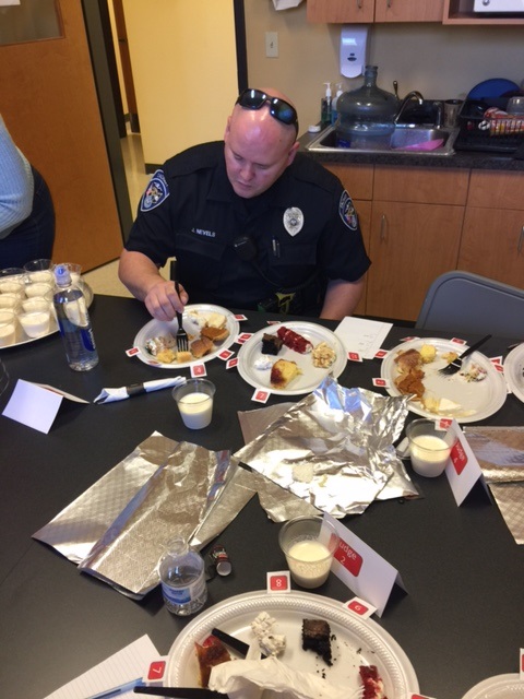 Sgt. Nevels judging the desserts