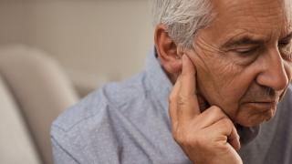 An Old Man at Elite Hearing Centre for Conductive Hearing Loss Treatment in Florida