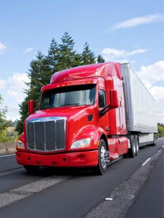 Red Truck driving on interstate