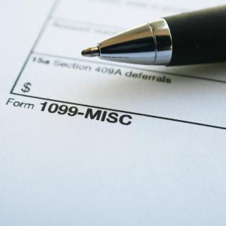 Pen with 1099 miscellaneous form