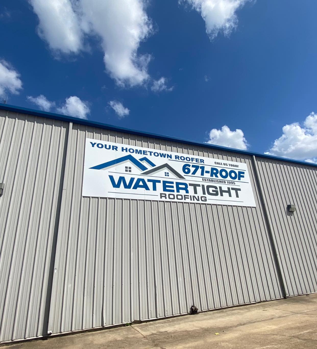 Watertight Roofing Sign