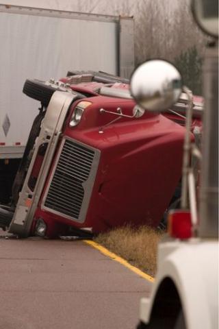 big truck rolled onto it's side