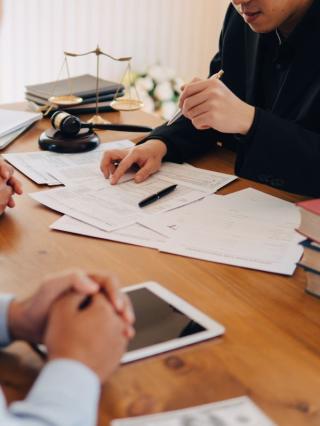 lawyer meeting with client in office