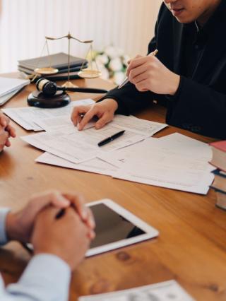 lawyer meeting with client in office