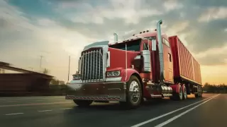 Red semi truck on the highway