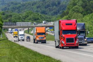 Semi trucks driving on a highway