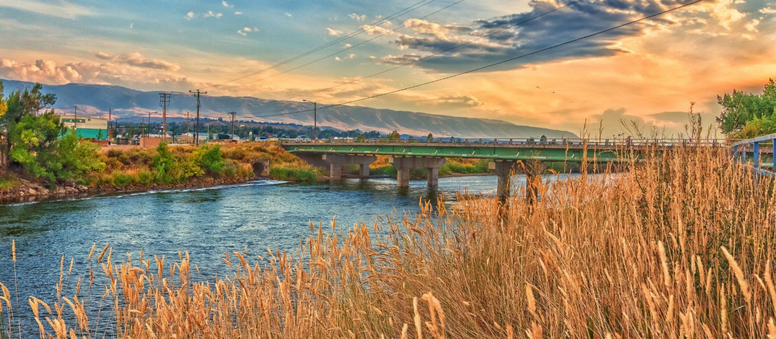 river running through Wyoming with a bridge