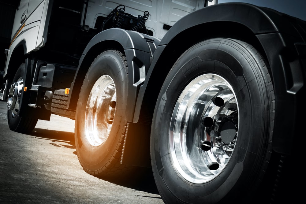 What to Do When a SemiTruck Tire Blowout Hits Your Car