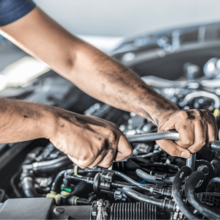 A man working on a used engine at patriot engines in baton rouge