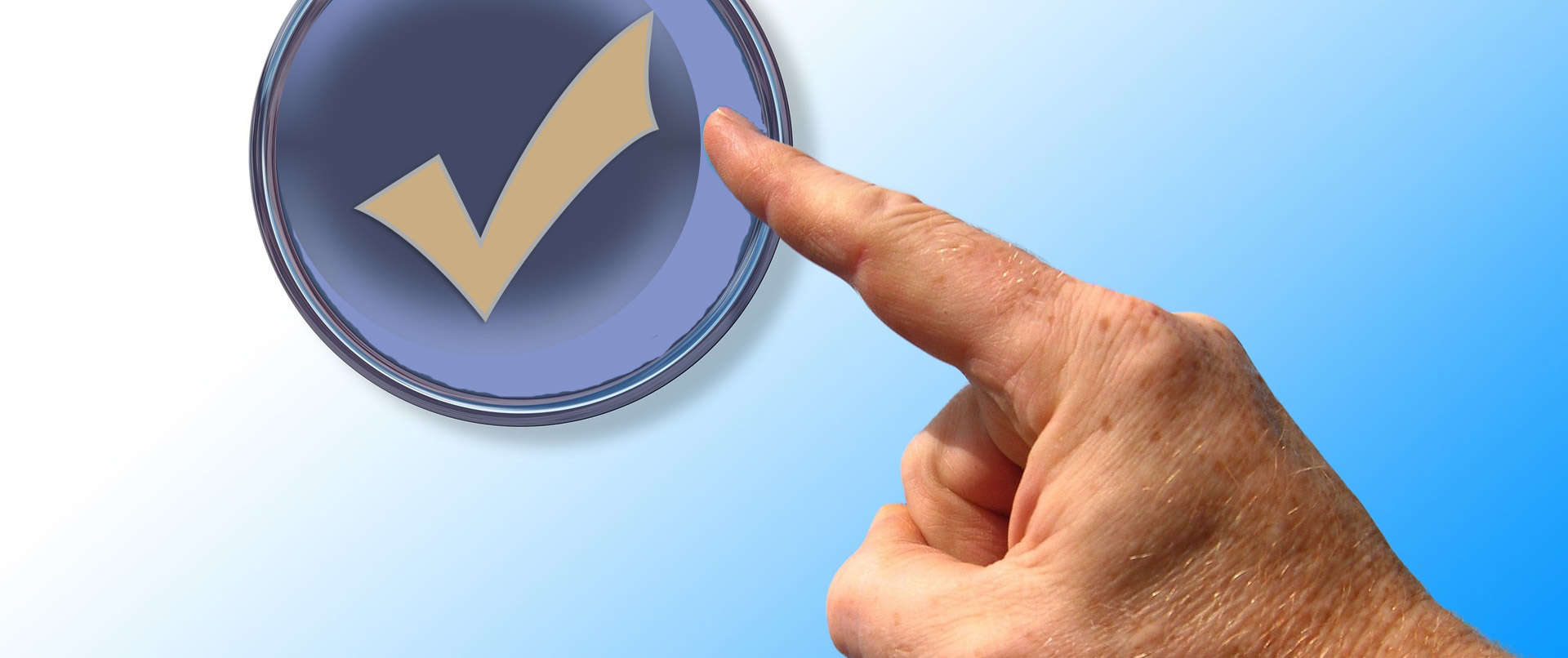 hand pointing at a round checkmark button