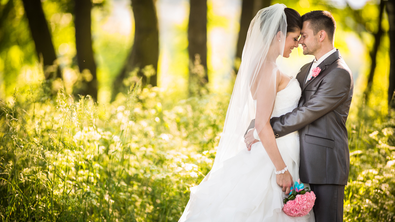 wedded couple in a field
