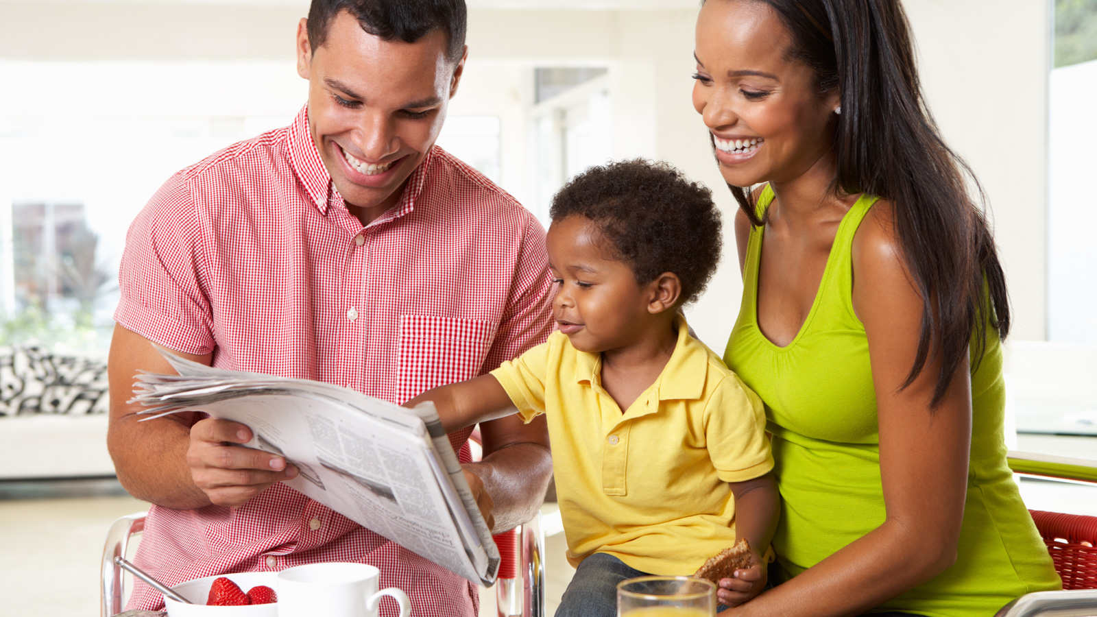 family enjoying breakfast together