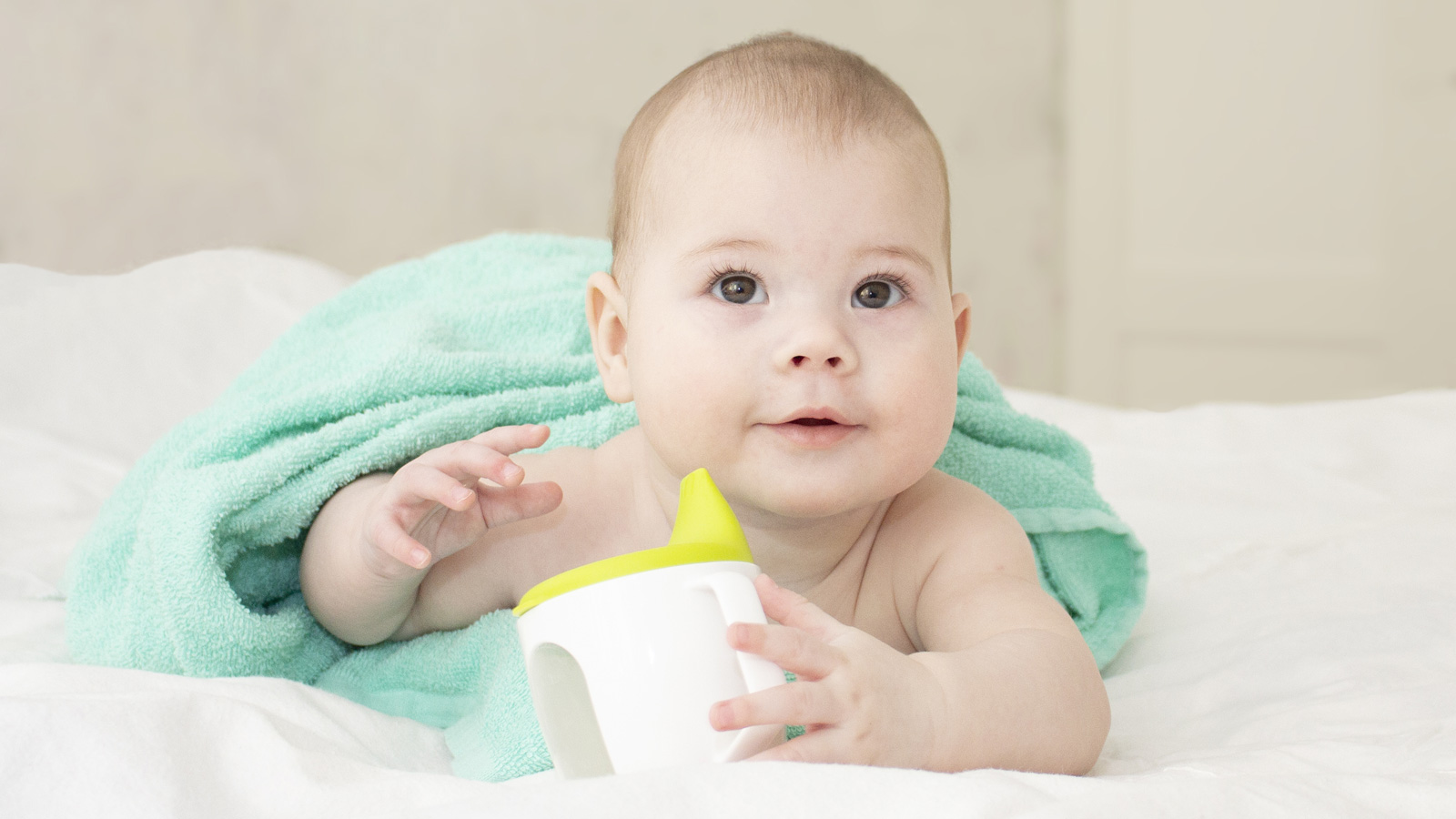 baby wrapped in a towel