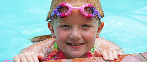 Young girl in swimming pool