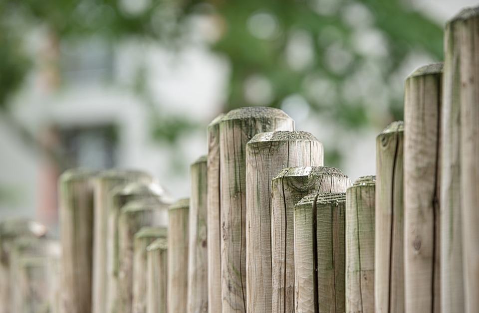 Predator Guard top of wood fence