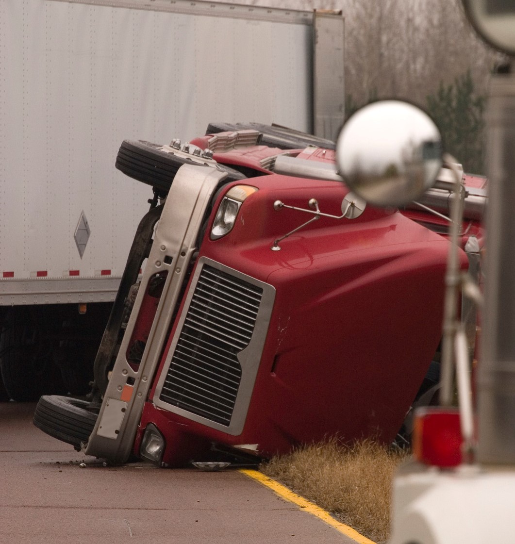 Truck turned on its side