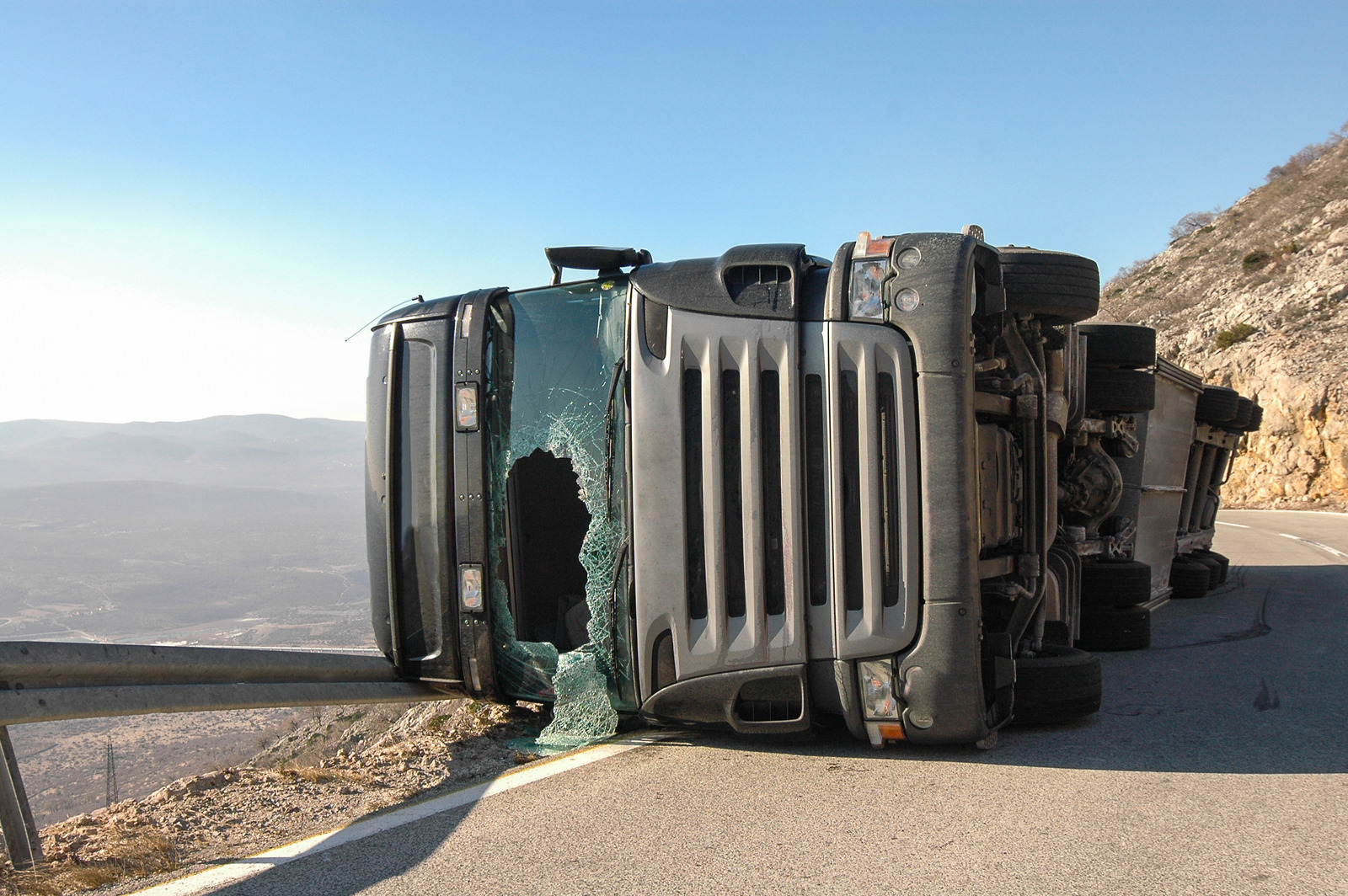 Crashed truck overturned on the road