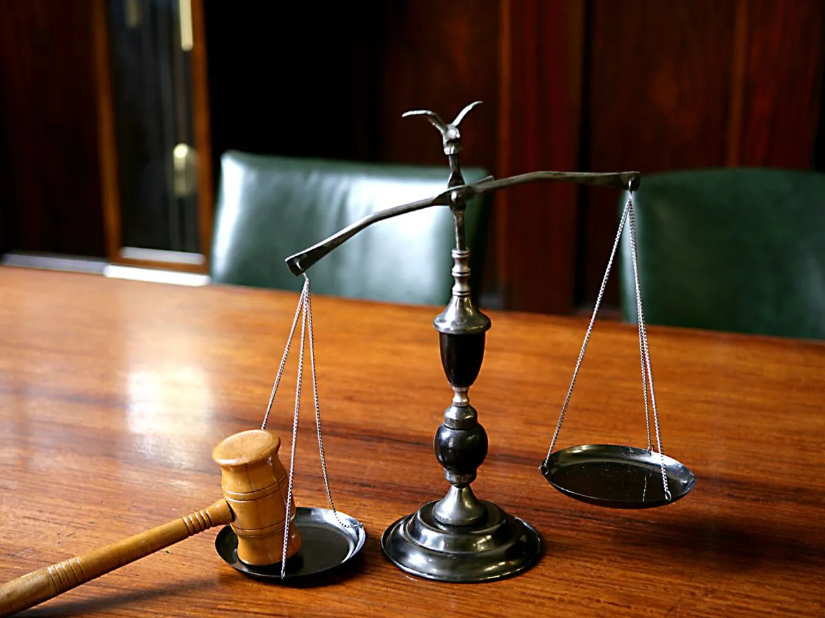 gavel and scale on a desk