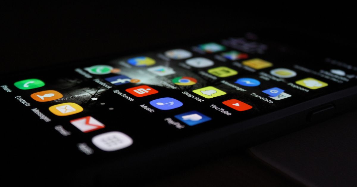 phone screen lit up in the dark, The Impact of Social Media on Your Car Accident Claim