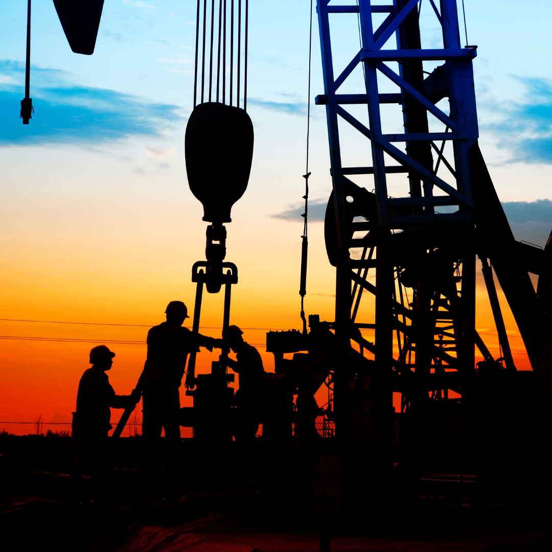 Oilfield workers working at a drilling site