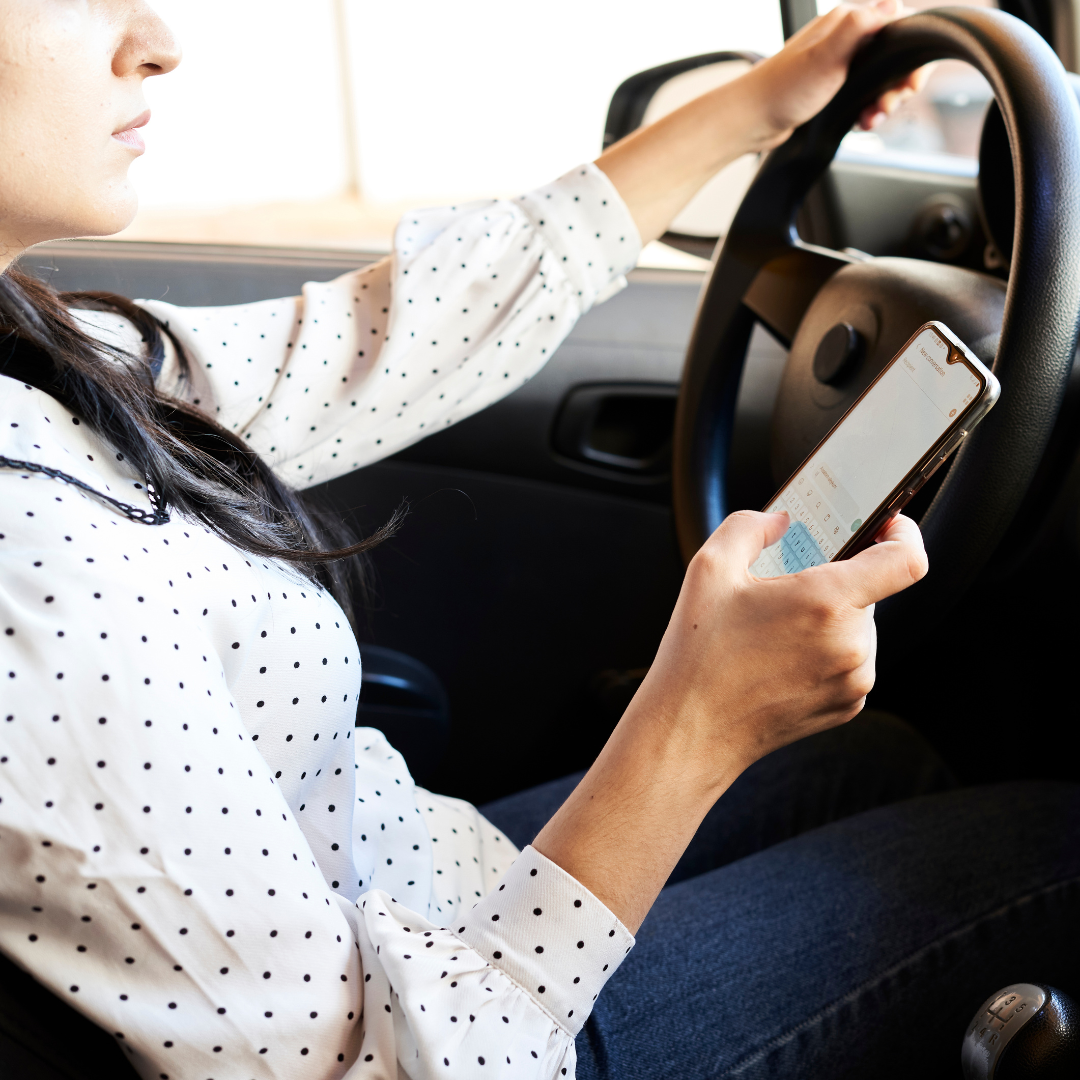 Woman Driving With Phone 