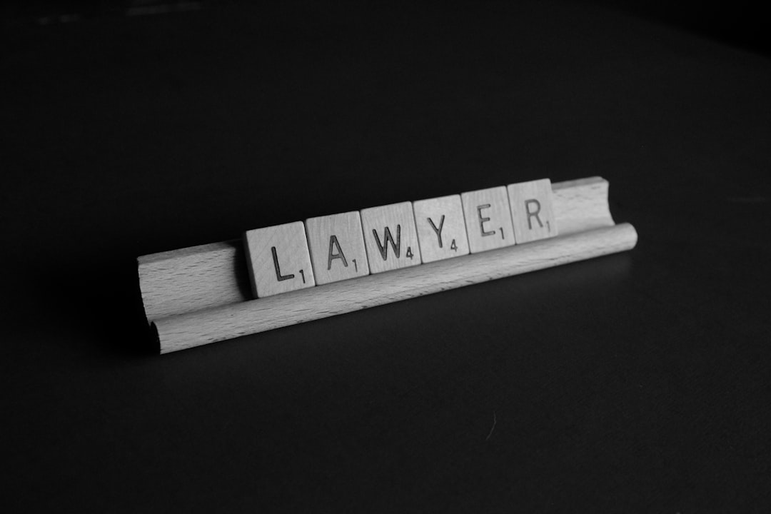 scrabble tiles spelling out the word lawyer