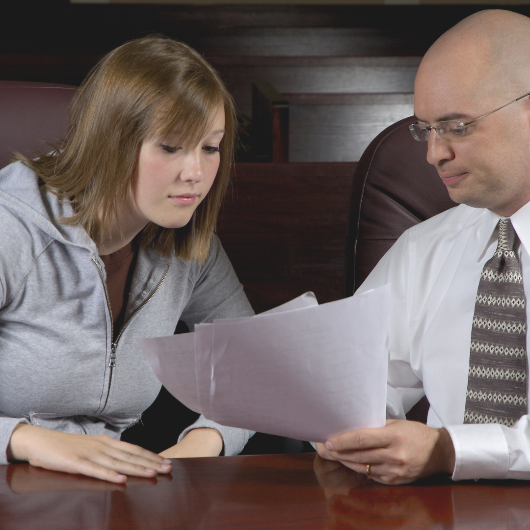 Attorney speaking with client