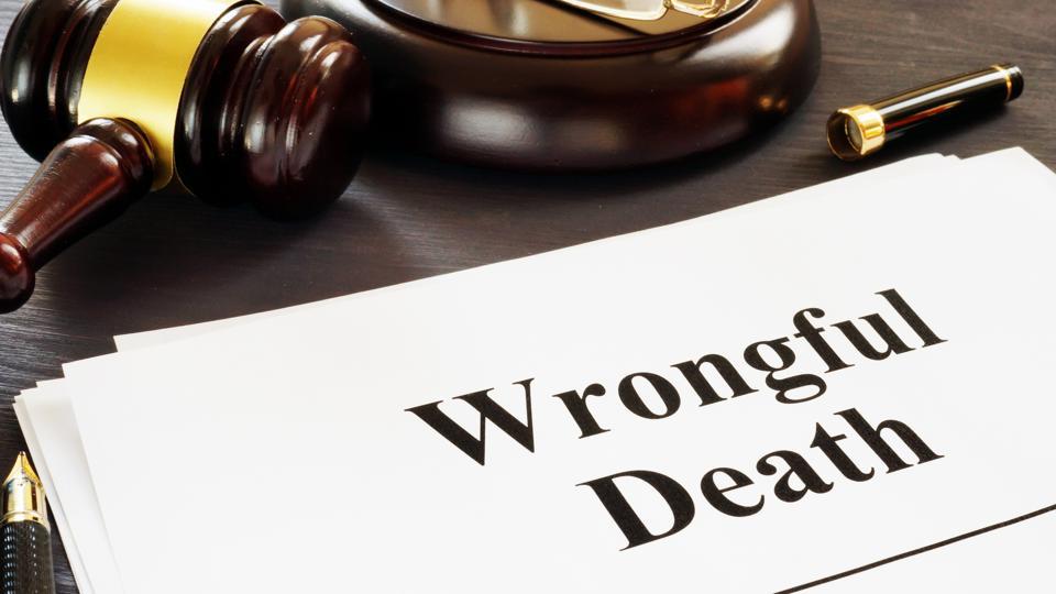 wrongful death papers and gavel on a desk