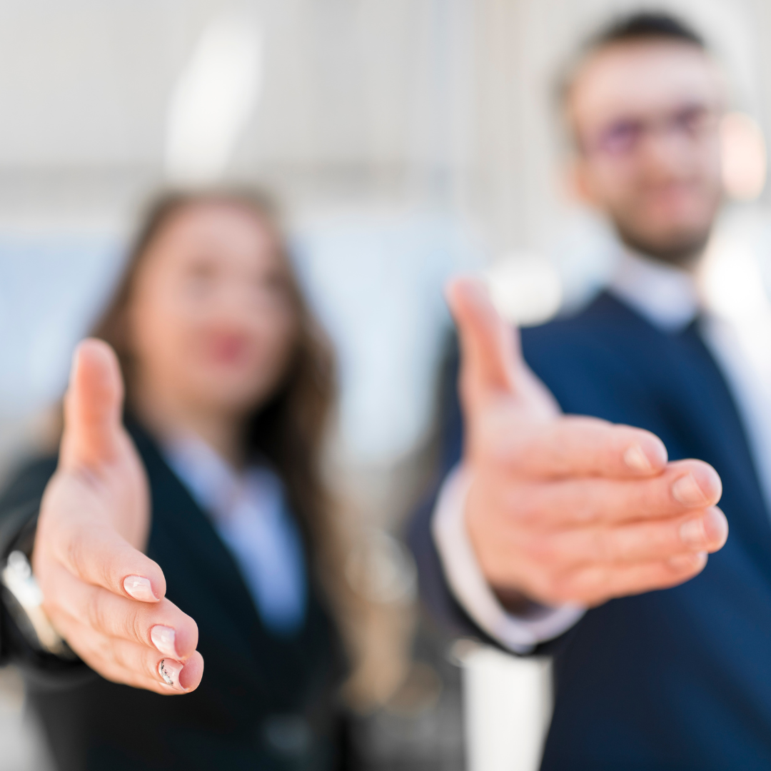 Attorneys reaching out to shake hands