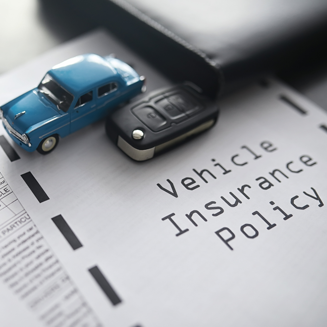 Car insurance policy on a desk