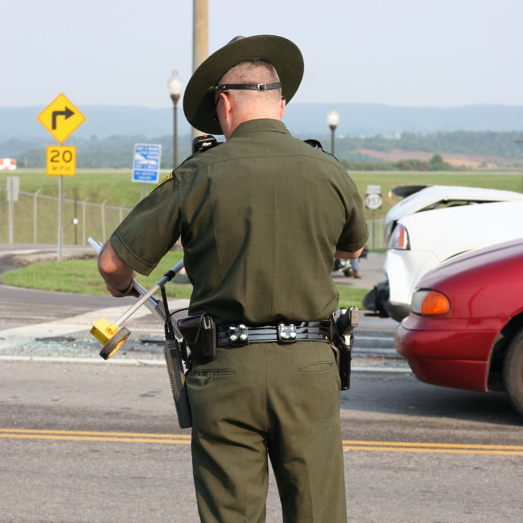 A police officer at an accident scene