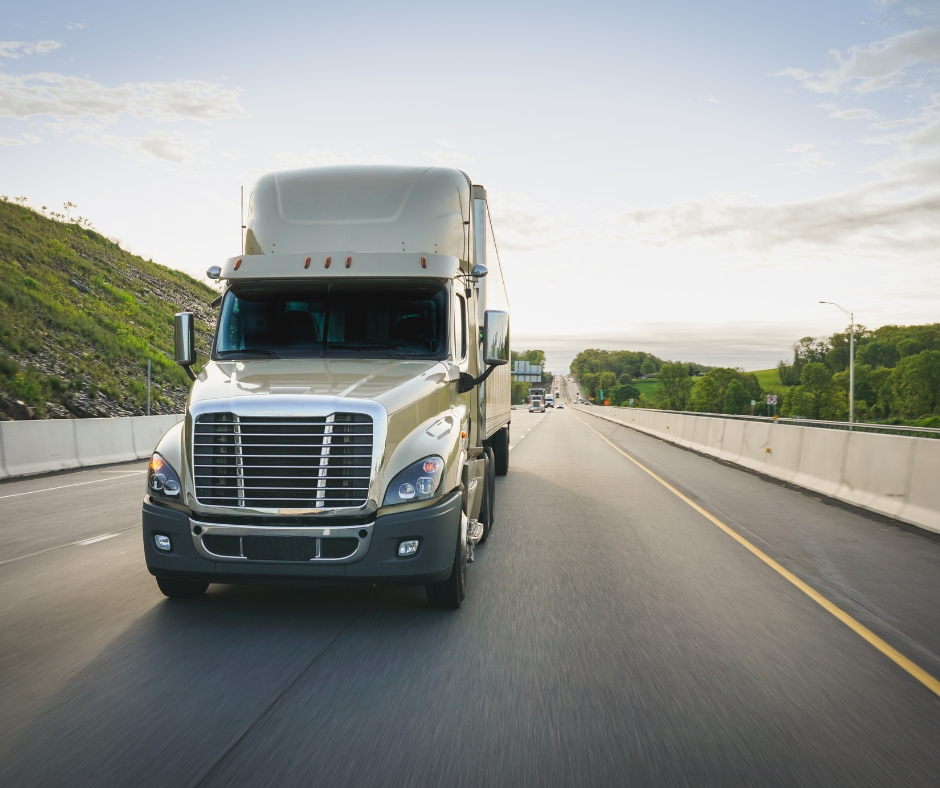 Silver diesel truck on the highway