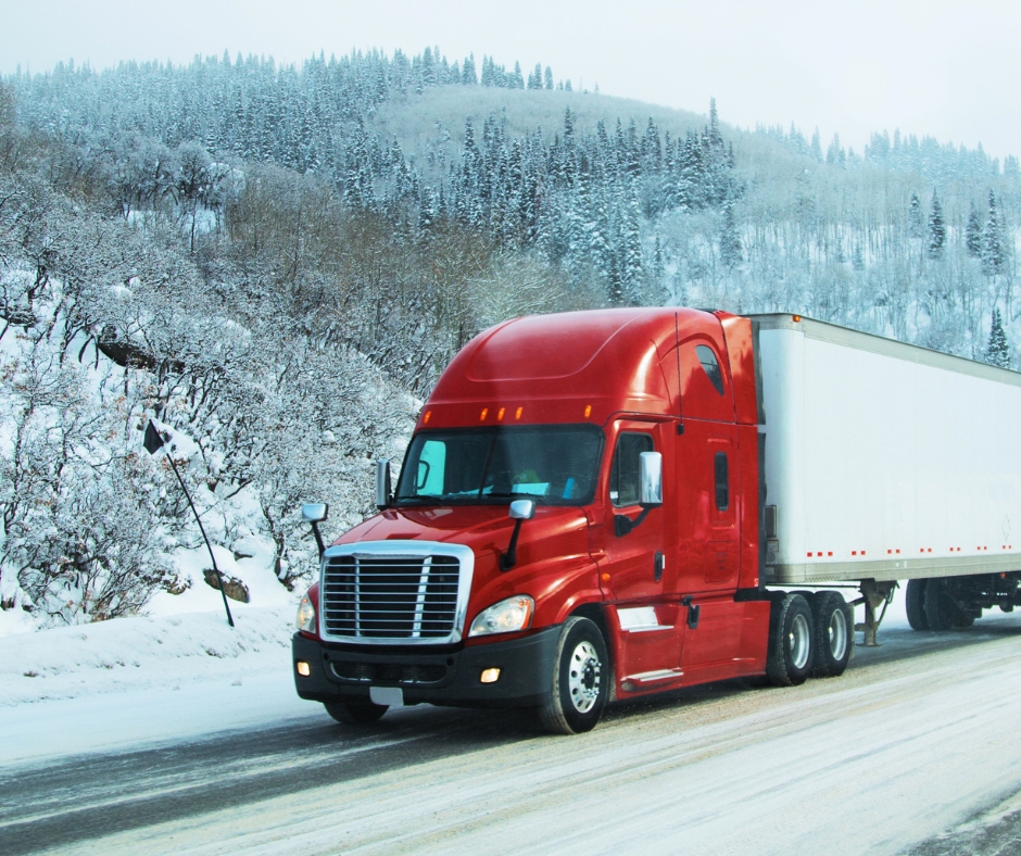 Red Semi Truck on Snowy Highway