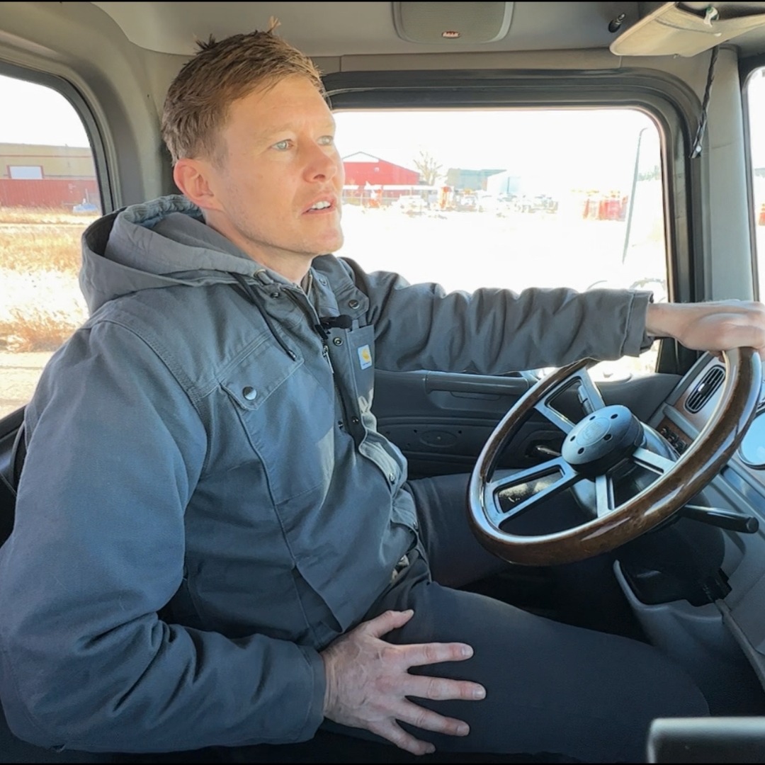 Attorney Mike Chaloupka Driving A Semi Truck